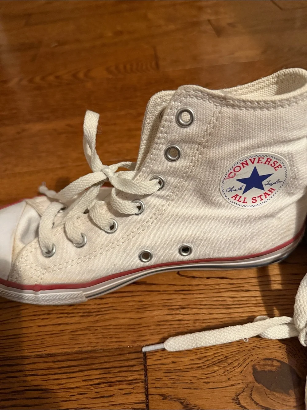Converse White High-Top Sneakers with Red Stripe